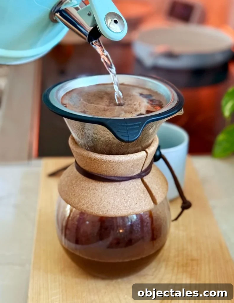 Pouring Boiled Water Into Pour Over Coffee Maker