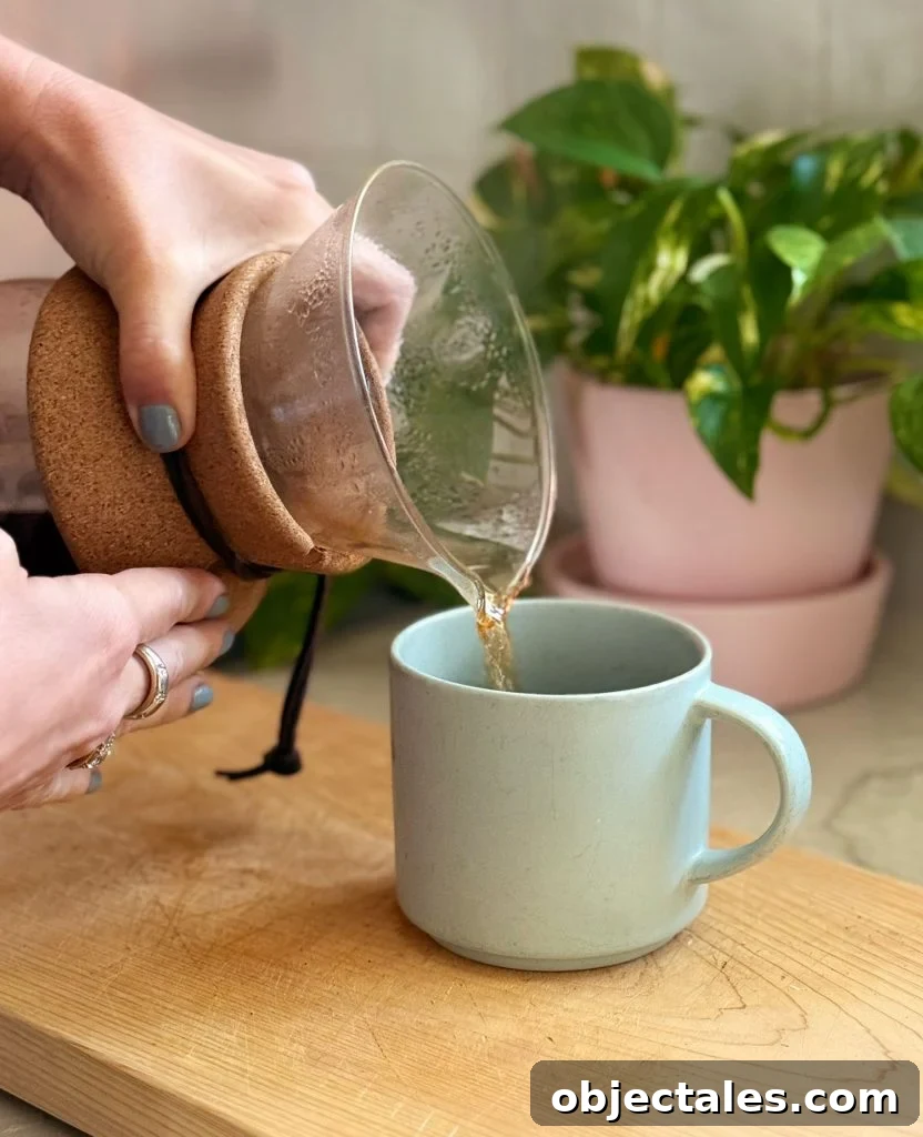 Pouring Pour Over Coffee Into Mug