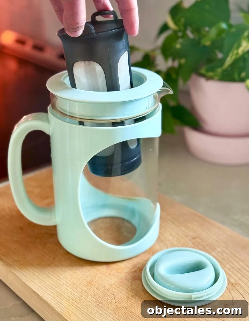 Make Smooth Cold Brew Coffee at Home 6 Addding Filter To Home Cold Brew Coffee Maker