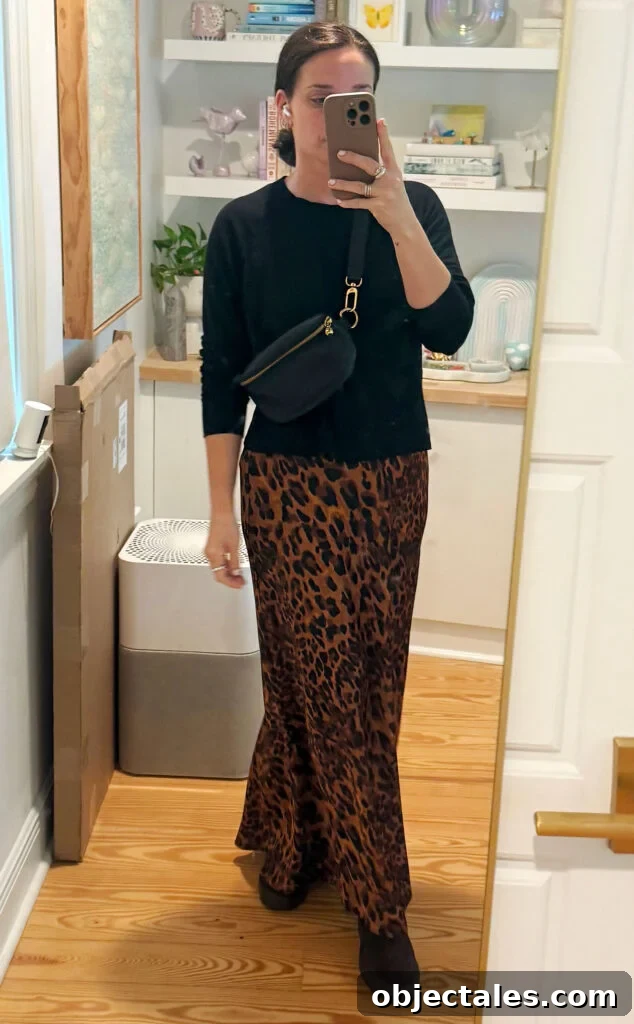 How I Packed One Carry-On for Two Weeks in Italy 11 Sherry Mirror Selfie In Outfit For Italy Black Sweater Leopard Maxi Skirt