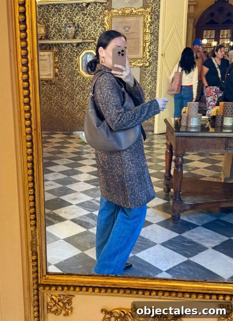 Sherry Selfie In Mirror With Leopard Coat And Jeans In Florence Italty