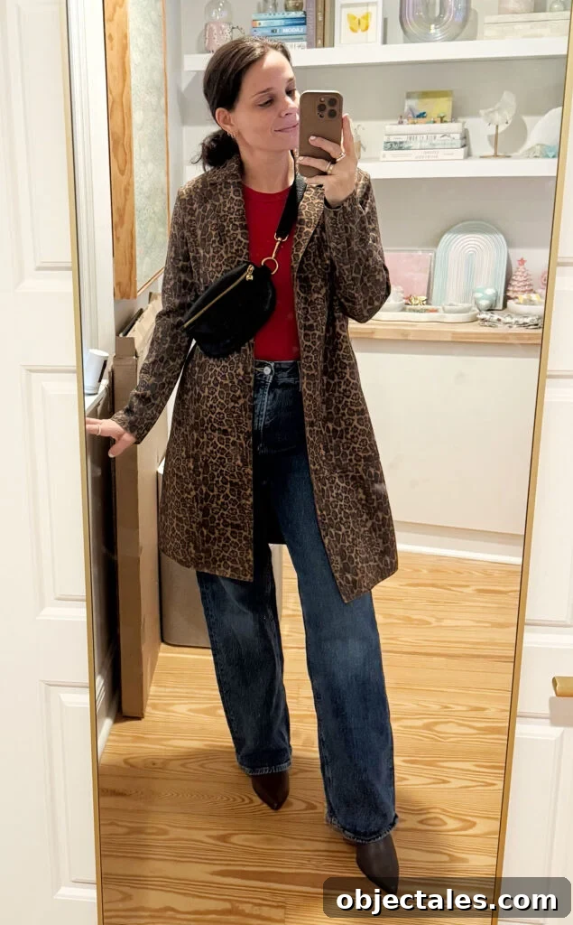 How I Packed One Carry-On for Two Weeks in Italy 5 Sherry Mirror Selfie In Outfit For Italy Red Tank Leopard Jacket Jeans