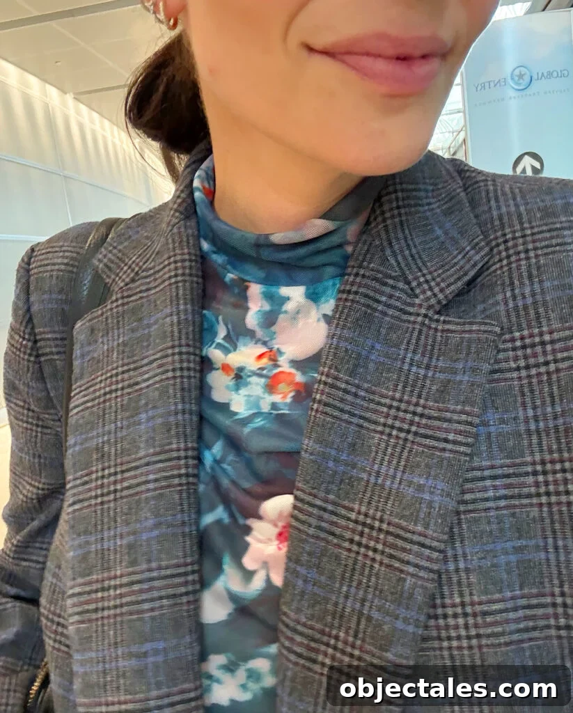 How I Packed One Carry-On for Two Weeks in Italy 7 Close Up Of Floral Mesh Shirt Under Tweed Blazer
