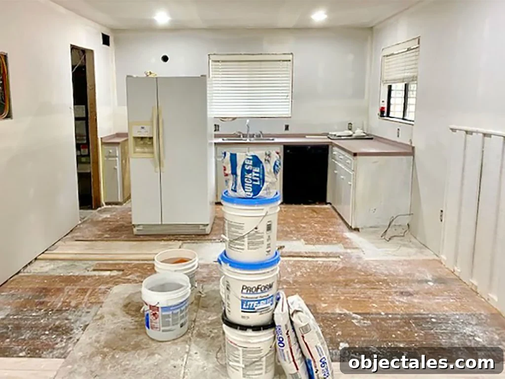 Renovating Our Home After Five Years 13 Kitchen Renovation With Dusty Floors And Refrigerator In The Middle Of The Room