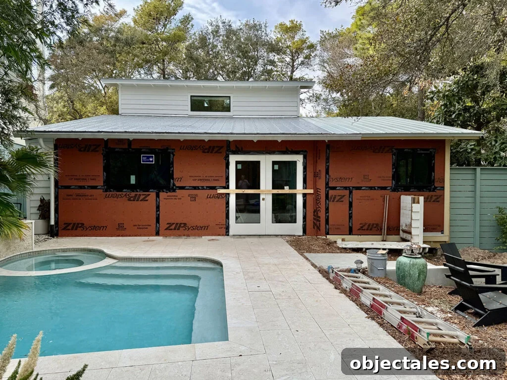Home Renovation Update: See the Mid-Project Video Tour 11 View Of Home Exterior During Renovation With Pool