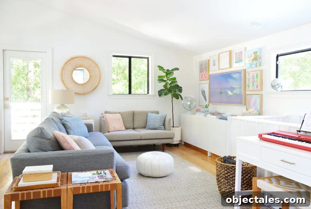 Home Renovation Update: See the Mid-Project Video Tour 14 Bright Family Room With Frame TV Collage Hung On Wall