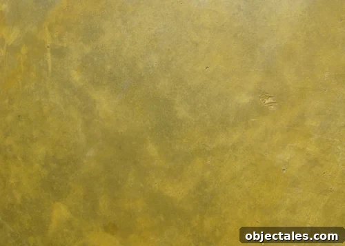 tuscangoldconcretestain close-up detail of stained concrete floor in Tuscan Gold color by Behr Semi-Transparent Concrete Stain