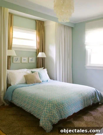 White faux wood blinds installed in bedroom