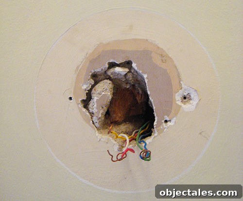 Thermostat removed, wiring exposed