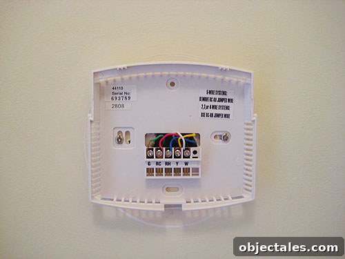 New Hunter thermostat being installed