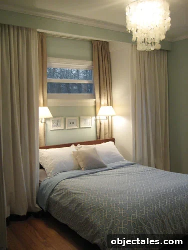 Bedroom window with wide tan curtains