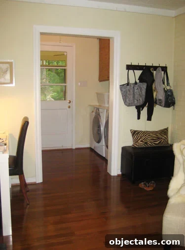 Open, painted den space with hardwood floors