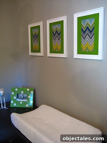 Nursery details Nursery framed fabric scraps and chandelier