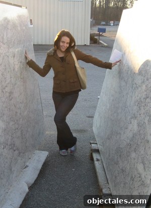 Two slabs of Pashmina granite leaning against a wall