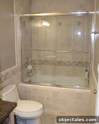Travertine tiled shower and floor