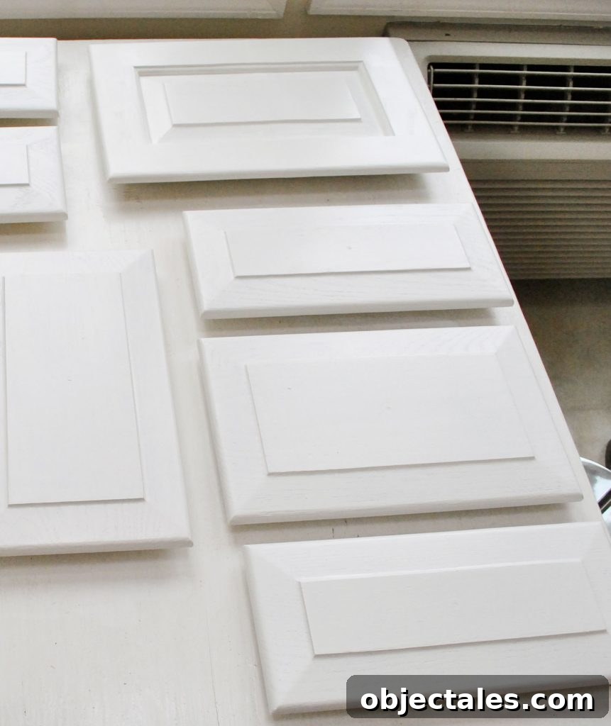 White Painted Kitchen Cabinet Doors Laid Out