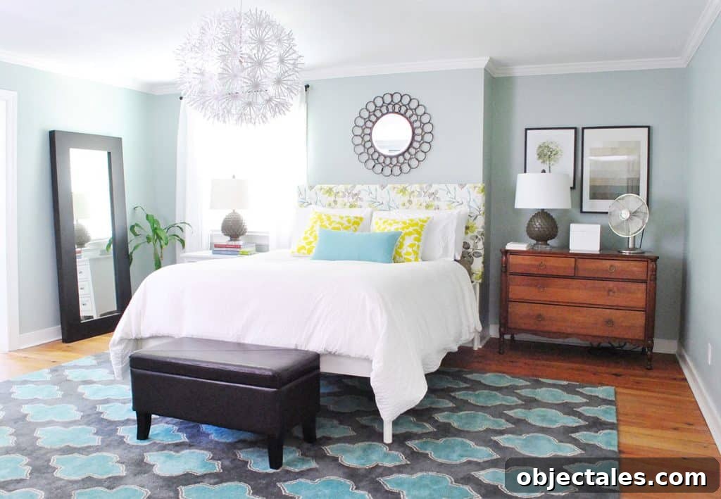 Blue bedroom with patterned DIY upholstered floral headboard