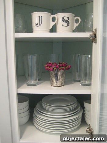 Kitchenware With Married Initials In Glass Fronted Cabinet