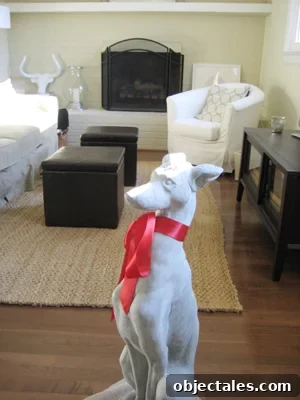 Puppy Love: How to Bond with Your New Dog 2 Concrete greyhound statue with red bow