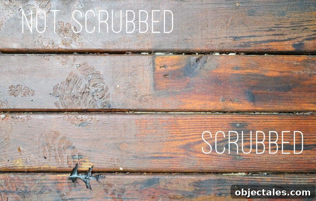 How to Strip a Deck for Staining: Remove Old Finish 12 Close up on scrubbed area of deck with finish removed