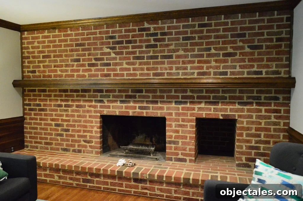 dark living room brick wall with a fireplace from 1980s home