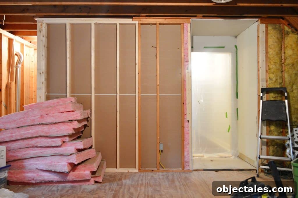 Hang Drywall Alone: Step-by-Step DIY Guide for One Person 14 after photo of backside of laundry room with drywall completed on inside
