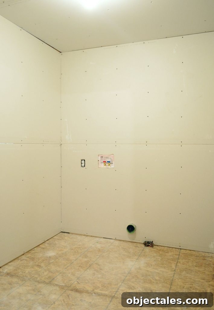 Hang Drywall Alone: Step-by-Step DIY Guide for One Person 15 inside photo of laundry room after drywall installation was completed