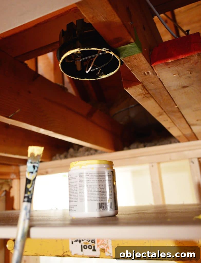 Hang Drywall Alone: Step-by-Step DIY Guide for One Person 7 light fixture box in ceiling marked with yellow paint
