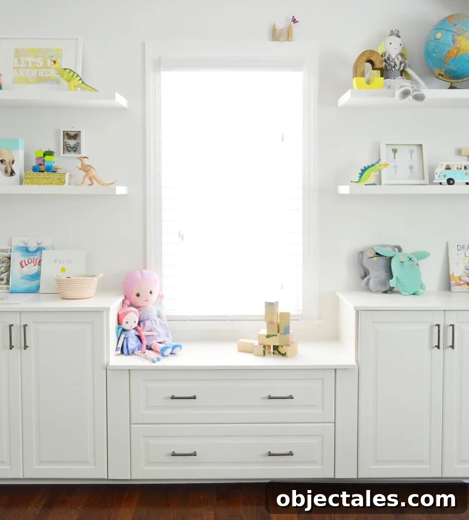 Built In Cabinets Under Window With Floating Shelves In Playroom