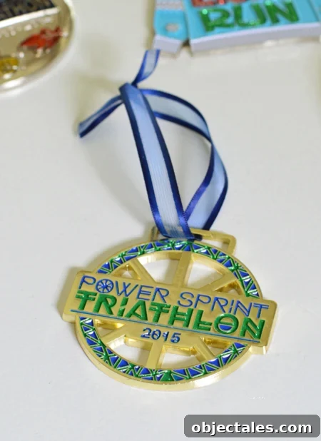 How to Turn Race Medals into Christmas Ornaments 6 triathlon race medal with shorter ribbon to be hung on christmas tree