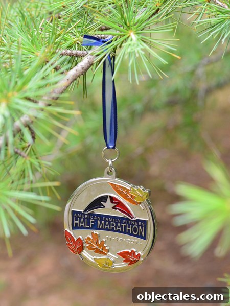 half marathon running race medal hung on christmas tree