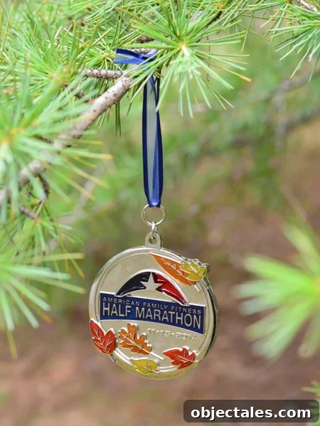 How to Turn Race Medals into Christmas Ornaments 7 half marathon running race medal hung on christmas tree