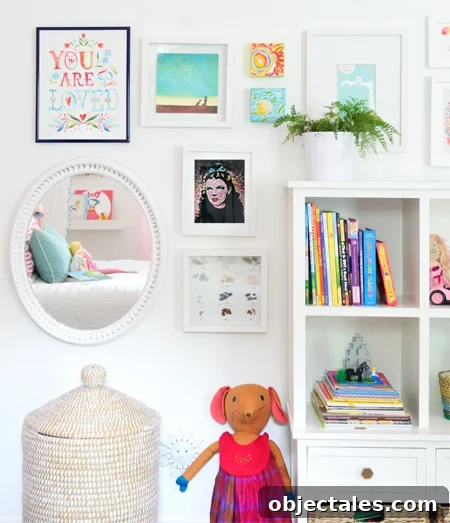 Our Daughter's Bedroom Makeover Timeline 22 GirlsRoom-Bookcase-Art-Frames-Detail