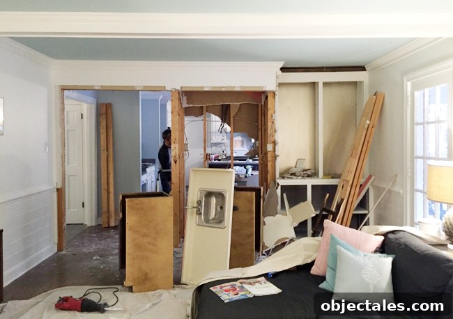 Kitchen Remodel Progress: Gutting and Rebuilding 5 kitchen-demo-wall-coming-down-fireplace