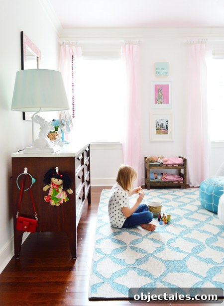 Child's room with white walls and colorful ceiling
