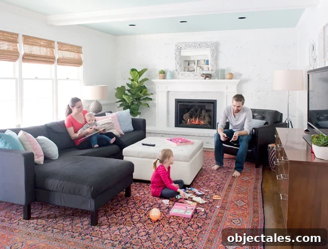 Living room with white walls and colorful ceiling