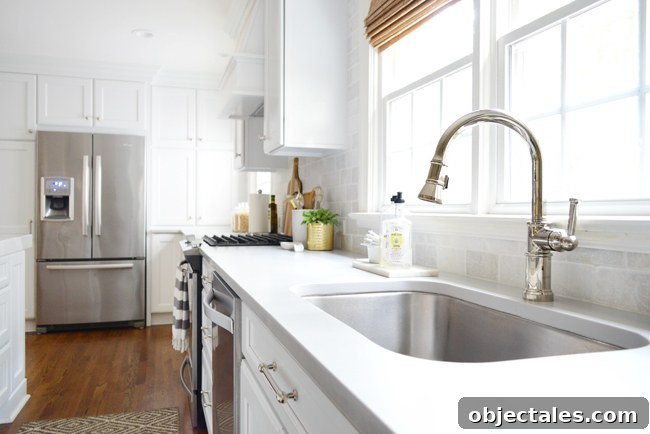 Kitchen Remodel Complete: Before and After Photos 12 white-kitchen-remodel-brizo-faucet
