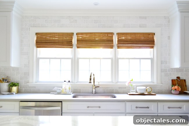 Kitchen Remodel Complete: Before and After Photos 16 white-kitchen-remodel-final-triple-window-over-sink