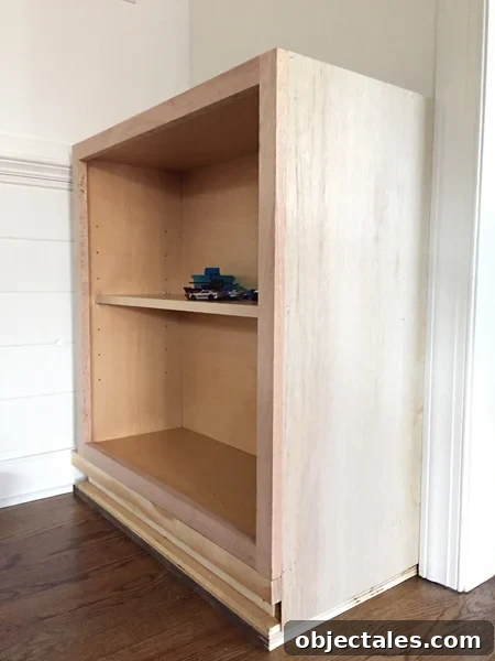 Build Custom Built-In Bookshelves: A Step-by-Step Guide 11 End Panel Attached To Base cabinet for built-in bookshelf