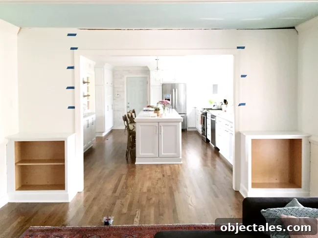Build Custom Built-In Bookshelves: A Step-by-Step Guide 14 Painters Tape On Wall To Determine Spacing of DIY built-in bookshelves
