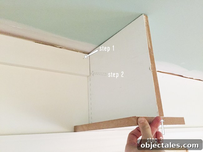 Build Custom Built-In Bookshelves: A Step-by-Step Guide 18 Attaching header piece to secure bookshelf across doorway