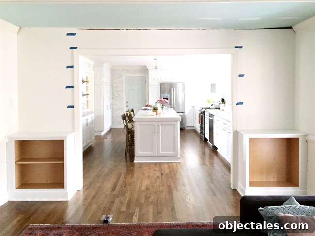 Build Custom Built-In Bookshelves: A Step-by-Step Guide 8 Painters Tape On Wall To Determine Spacing of DIY built-in bookshelves