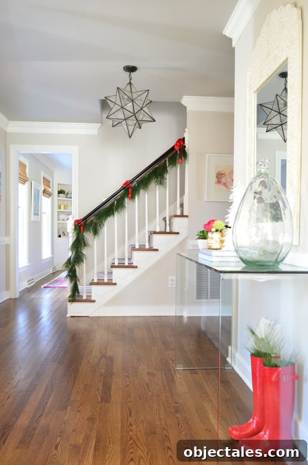 Holiday Home Tour: See Our Christmas Tree and Holiday Decor 10 xmas-decor-foyer-console-with-stairs