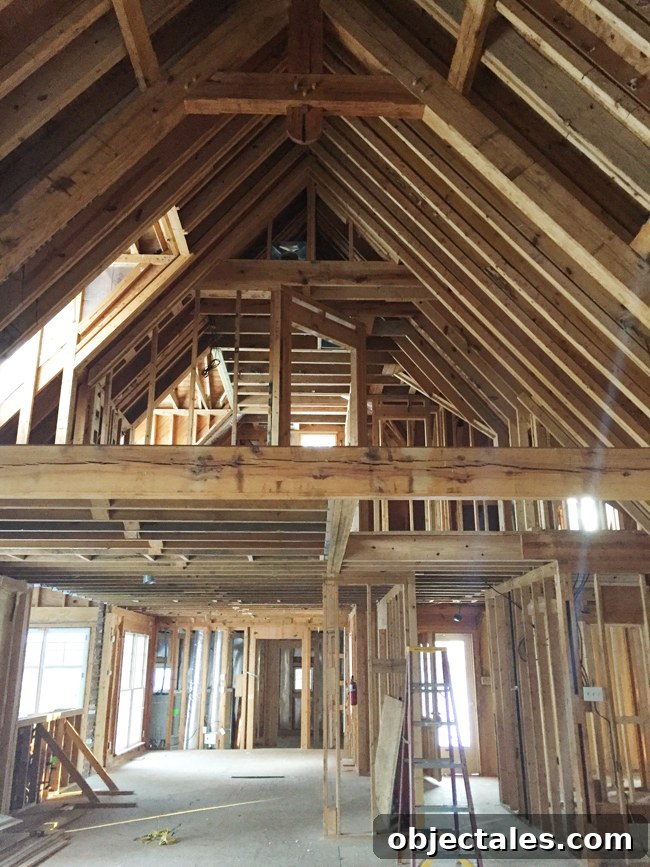 Interior photo showing stairs and open floor plan