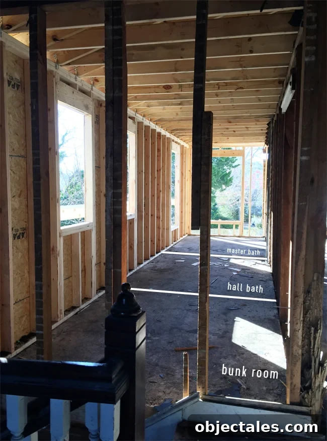 Beach House Gut Renovation: Stripping It Down to the Studs 21 View of rebuilt walls from stairs