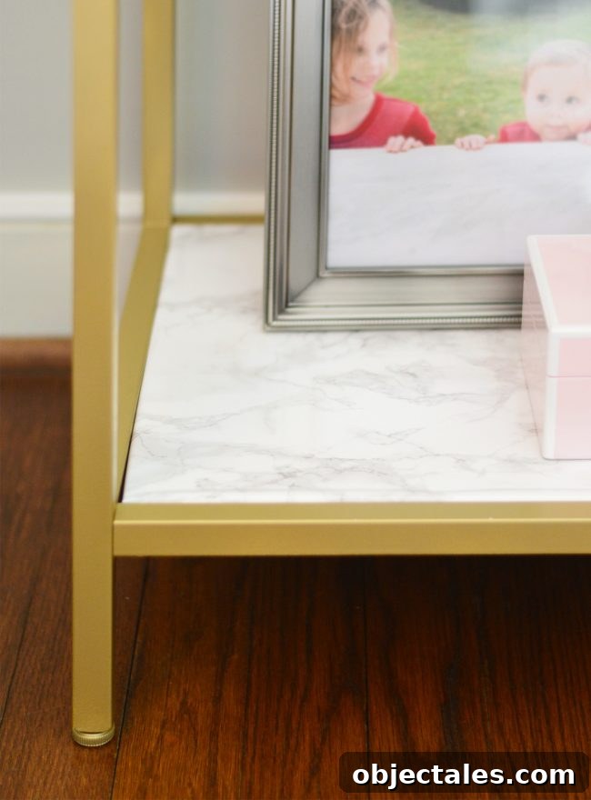 ikea metal shelf hack with gold spray paint marble contact paper