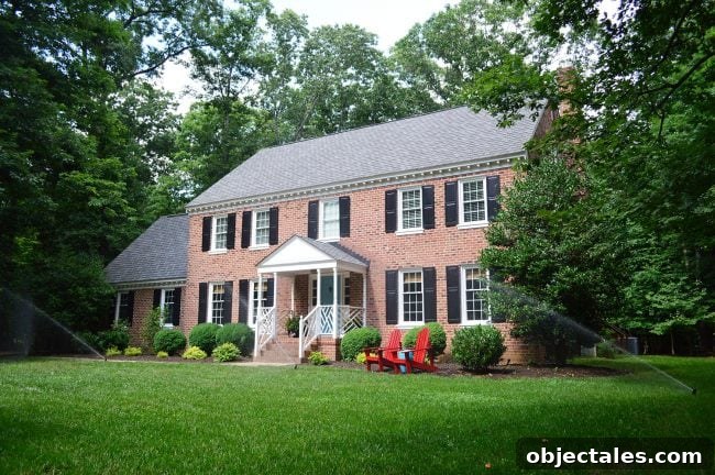 Install Your DIY Sprinkler System: Step-by-Step Guide 3 irrigation system watering lawn of brick colonial home