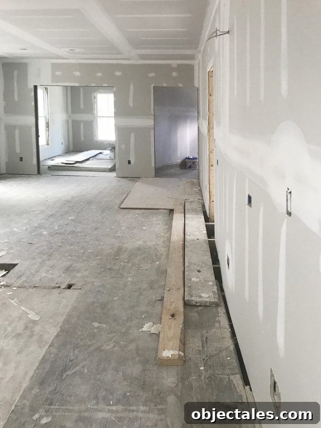 What Is Feng Shui and Are We Doing It Wrong? 2 Drywall progress in the beach house foyer