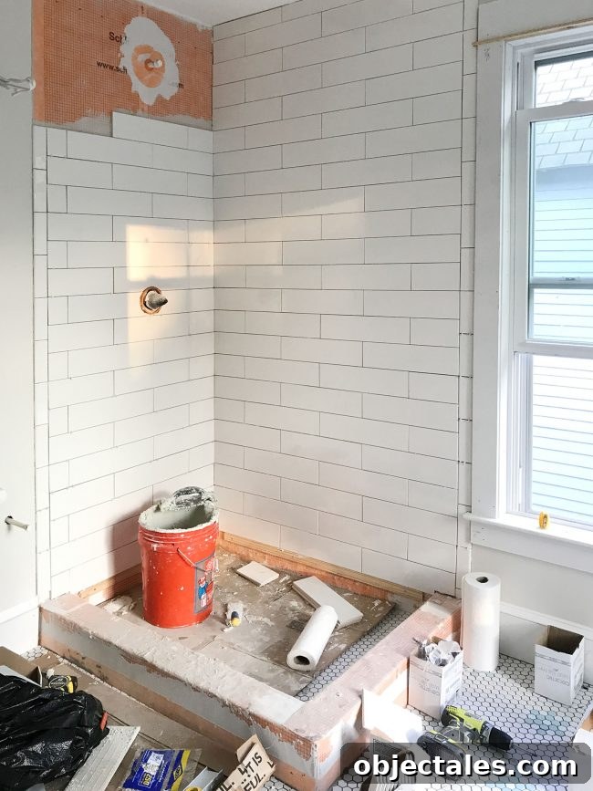 Working on tile at the beach house