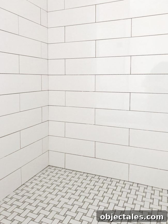 En-suite shower with hex tile floor